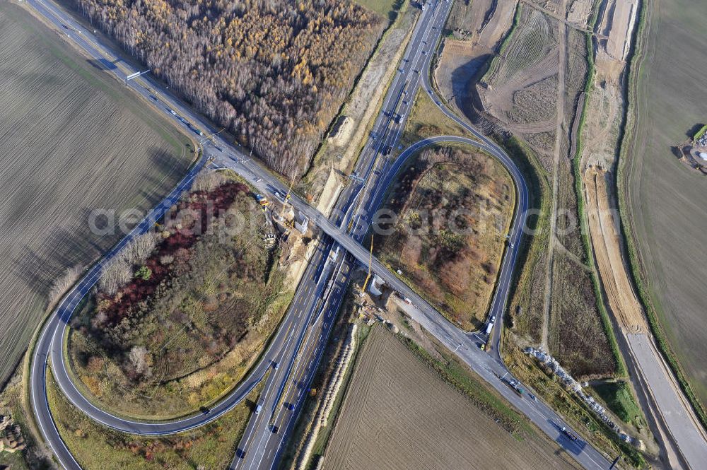 SCHWANEBECK from the bird's eye view: Baustelle vom Autobahndreieck Kreuz Barnim, vormals AD Schwanebeck, mit Aus- und Umbauarbeiten. Die EUROVIA führt im Auftrag des Landesbetrieb Brandenburg umfangreiche Abbruch-, Erdarbeiten und den Neubau von Brückenbauwerken zum Um- und Ausbau des Autobahndreiecks (AD) Barnim am nördlichen Berliner Ring durch. View of the construction site at the highway triangle Kreuz Barnim.