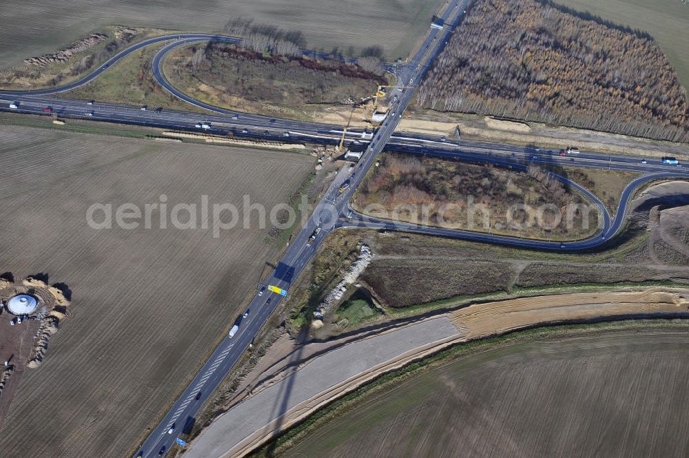 SCHWANEBECK from above - Baustelle vom Autobahndreieck Kreuz Barnim, vormals AD Schwanebeck, mit Aus- und Umbauarbeiten. Die EUROVIA führt im Auftrag des Landesbetrieb Brandenburg umfangreiche Abbruch-, Erdarbeiten und den Neubau von Brückenbauwerken zum Um- und Ausbau des Autobahndreiecks (AD) Barnim am nördlichen Berliner Ring durch. View of the construction site at the highway triangle Kreuz Barnim.