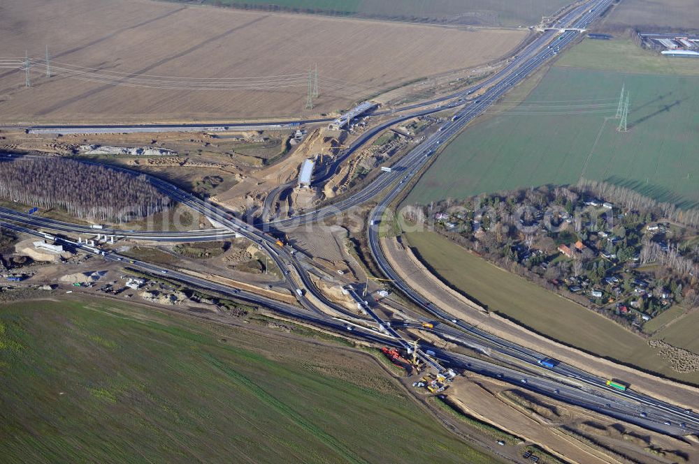 Aerial image SCHWANEBECK - Baustelle vom Autobahndreieck Kreuz Barnim, vormals AD Schwanebeck, mit Aus- und Umbauarbeiten. Die EUROVIA führt im Auftrag des Landesbetrieb Brandenburg umfangreiche Abbruch-, Erdarbeiten und den Neubau von Brückenbauwerken zum Um- und Ausbau des Autobahndreiecks (AD) Barnim am nördlichen Berliner Ring durch. View of the construction site at the highway triangle Kreuz Barnim.