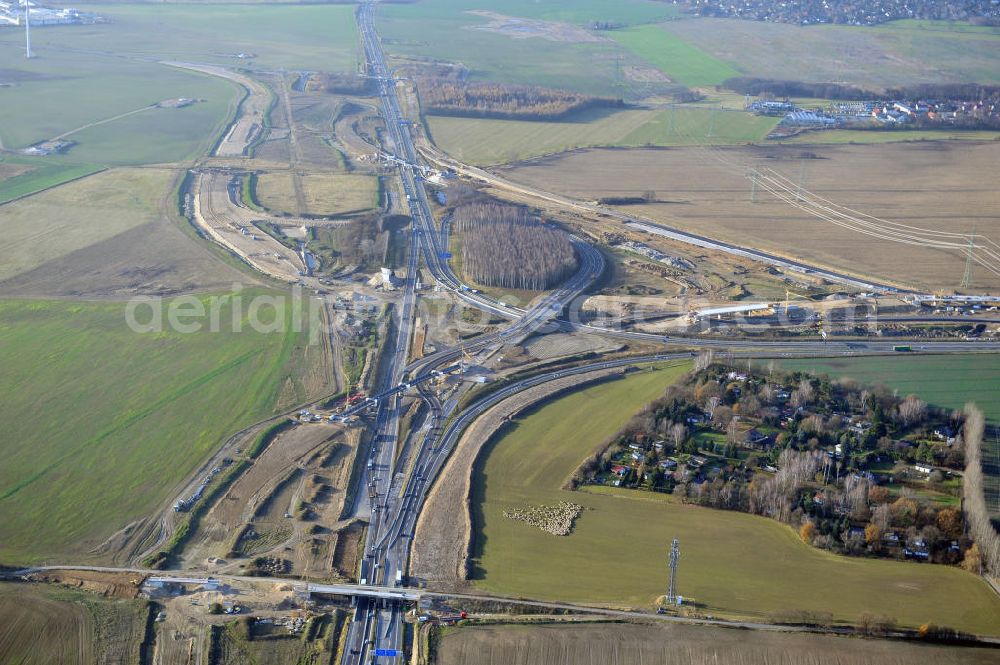 SCHWANEBECK from the bird's eye view: Baustelle vom Autobahndreieck Kreuz Barnim, vormals AD Schwanebeck, mit Aus- und Umbauarbeiten. Die EUROVIA führt im Auftrag des Landesbetrieb Brandenburg umfangreiche Abbruch-, Erdarbeiten und den Neubau von Brückenbauwerken zum Um- und Ausbau des Autobahndreiecks (AD) Barnim am nördlichen Berliner Ring durch. View of the construction site at the highway triangle Kreuz Barnim.