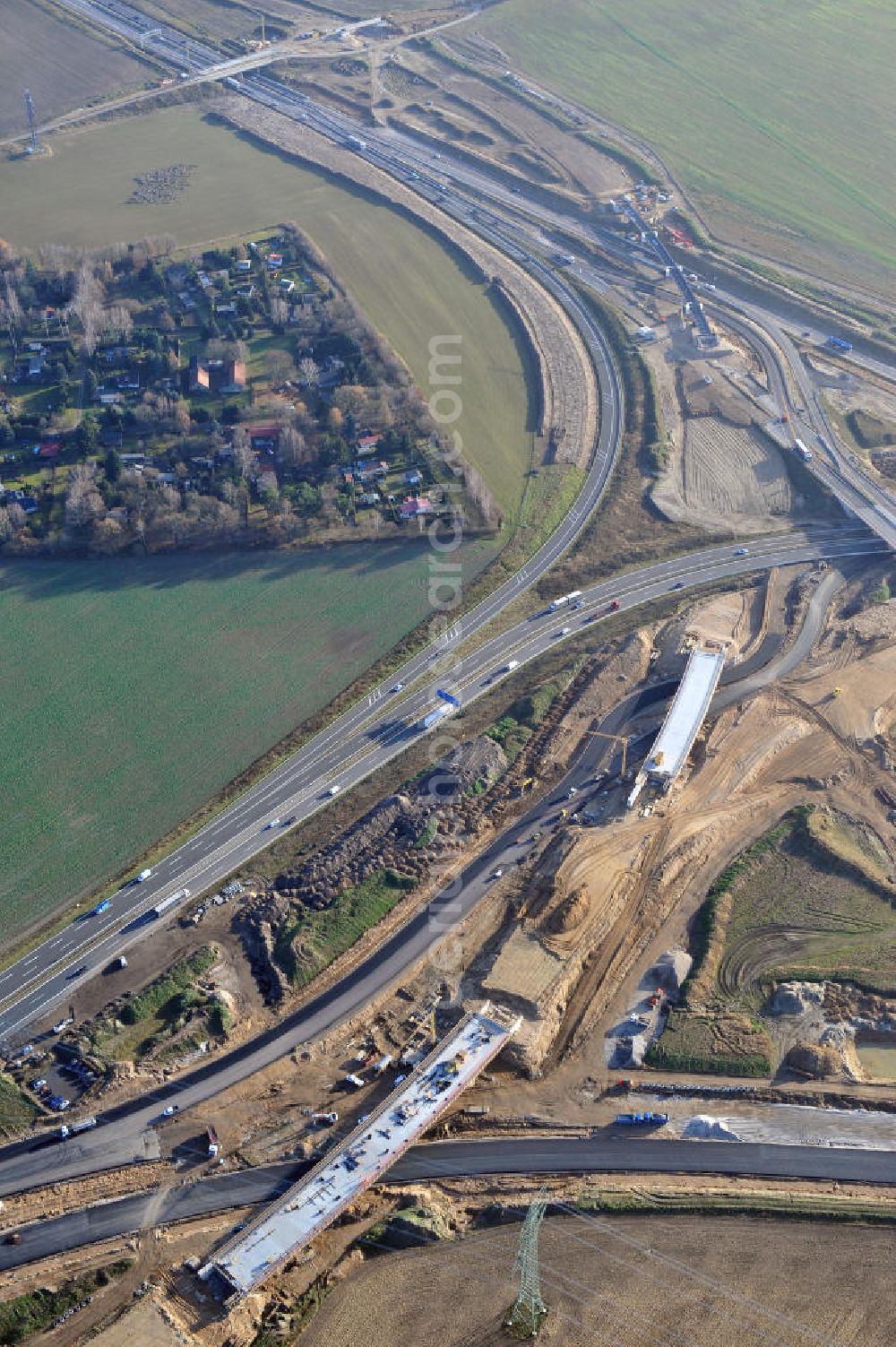 SCHWANEBECK from above - Baustelle vom Autobahndreieck Kreuz Barnim, vormals AD Schwanebeck, mit Aus- und Umbauarbeiten. Die EUROVIA führt im Auftrag des Landesbetrieb Brandenburg umfangreiche Abbruch-, Erdarbeiten und den Neubau von Brückenbauwerken zum Um- und Ausbau des Autobahndreiecks (AD) Barnim am nördlichen Berliner Ring durch. View of the construction site at the highway triangle Kreuz Barnim.