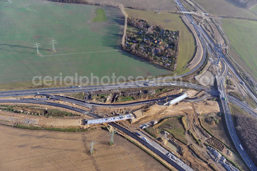 SCHWANEBECK from the bird's eye view: Baustelle vom Autobahndreieck Kreuz Barnim, vormals AD Schwanebeck, mit Aus- und Umbauarbeiten. Die EUROVIA führt im Auftrag des Landesbetrieb Brandenburg umfangreiche Abbruch-, Erdarbeiten und den Neubau von Brückenbauwerken zum Um- und Ausbau des Autobahndreiecks (AD) Barnim am nördlichen Berliner Ring durch. View of the construction site at the highway triangle Kreuz Barnim.