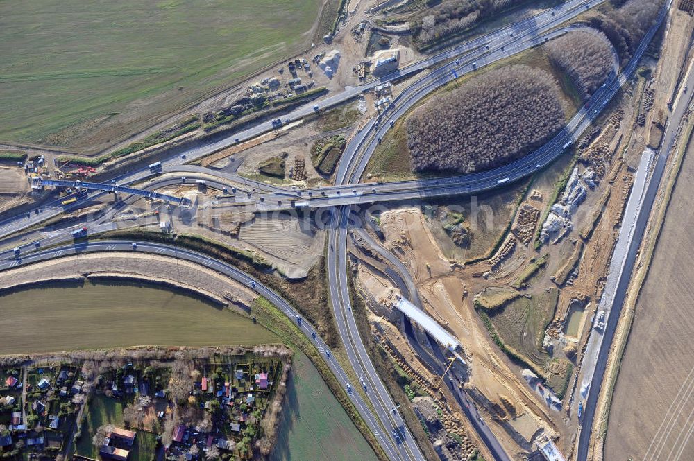 Aerial photograph SCHWANEBECK - Baustelle vom Autobahndreieck Kreuz Barnim, vormals AD Schwanebeck, mit Aus- und Umbauarbeiten. Die EUROVIA führt im Auftrag des Landesbetrieb Brandenburg umfangreiche Abbruch-, Erdarbeiten und den Neubau von Brückenbauwerken zum Um- und Ausbau des Autobahndreiecks (AD) Barnim am nördlichen Berliner Ring durch. View of the construction site at the highway triangle Kreuz Barnim.