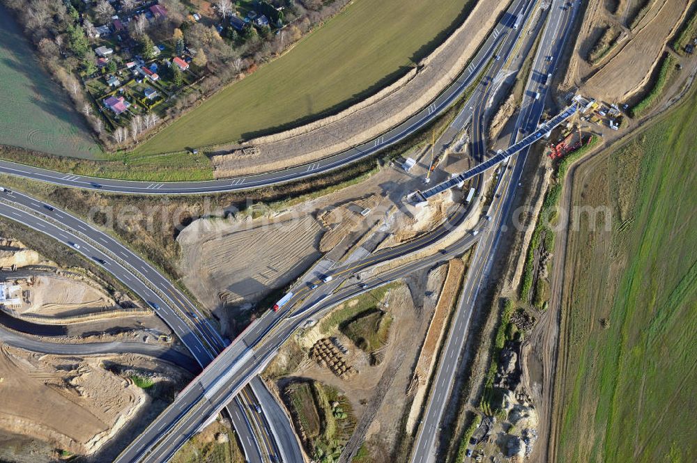 SCHWANEBECK from the bird's eye view: Baustelle vom Autobahndreieck Kreuz Barnim, vormals AD Schwanebeck, mit Aus- und Umbauarbeiten. Die EUROVIA führt im Auftrag des Landesbetrieb Brandenburg umfangreiche Abbruch-, Erdarbeiten und den Neubau von Brückenbauwerken zum Um- und Ausbau des Autobahndreiecks (AD) Barnim am nördlichen Berliner Ring durch. View of the construction site at the highway triangle Kreuz Barnim.