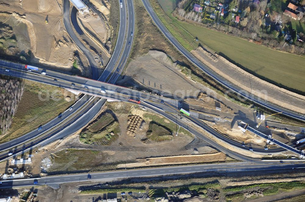 Aerial image SCHWANEBECK - Baustelle vom Autobahndreieck Kreuz Barnim, vormals AD Schwanebeck, mit Aus- und Umbauarbeiten. Die EUROVIA führt im Auftrag des Landesbetrieb Brandenburg umfangreiche Abbruch-, Erdarbeiten und den Neubau von Brückenbauwerken zum Um- und Ausbau des Autobahndreiecks (AD) Barnim am nördlichen Berliner Ring durch. View of the construction site at the highway triangle Kreuz Barnim.