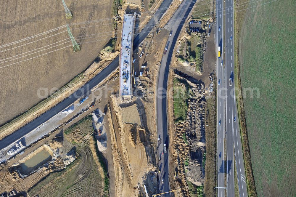 SCHWANEBECK from the bird's eye view: Baustelle vom Autobahndreieck Kreuz Barnim, vormals AD Schwanebeck, mit Aus- und Umbauarbeiten. Die EUROVIA führt im Auftrag des Landesbetrieb Brandenburg umfangreiche Abbruch-, Erdarbeiten und den Neubau von Brückenbauwerken zum Um- und Ausbau des Autobahndreiecks (AD) Barnim am nördlichen Berliner Ring durch. View of the construction site at the highway triangle Kreuz Barnim.