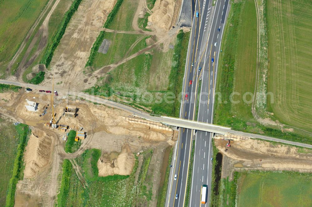 Aerial photograph Schwanebeck / Barnim - Baustelle vom Autobahndreieck Kreuz Barnim , vormals AD Schwanebeck, mit Aus- und Umbauarbeiten. View of the construction site at the highway triangle Kreuz Barnim.