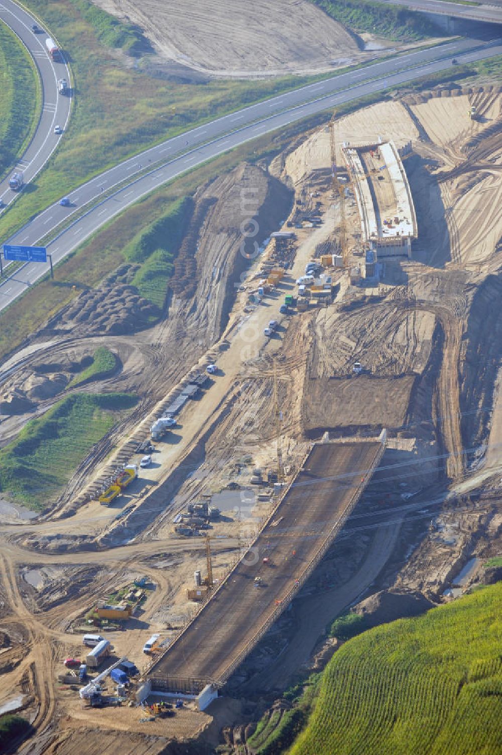 Aerial image Schwanebeck - Baustelle vom Autobahndreieck Kreuz Barnim, vormals AD Schwanebeck, mit Aus- und Umbauarbeiten. Die EUROVIA führt im Auftrag des Landesbetrieb Brandenburg umfangreiche Abbruch-, Erdarbeiten und den Neubau von Brückenbauwerken zum Um- und Ausbau des Autobahndreiecks (AD) Barnim am nördlichen Berliner Ring durch. View of the construction site at the highway triangle Kreuz Barnim.