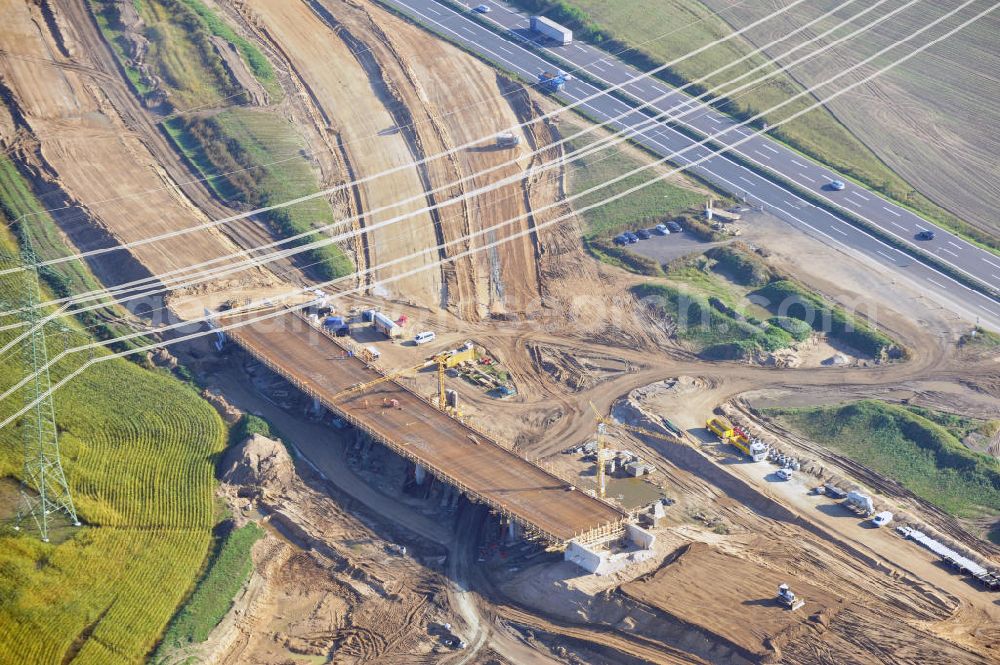 Schwanebeck from the bird's eye view: Baustelle vom Autobahndreieck Kreuz Barnim, vormals AD Schwanebeck, mit Aus- und Umbauarbeiten. Die EUROVIA führt im Auftrag des Landesbetrieb Brandenburg umfangreiche Abbruch-, Erdarbeiten und den Neubau von Brückenbauwerken zum Um- und Ausbau des Autobahndreiecks (AD) Barnim am nördlichen Berliner Ring durch. View of the construction site at the highway triangle Kreuz Barnim.