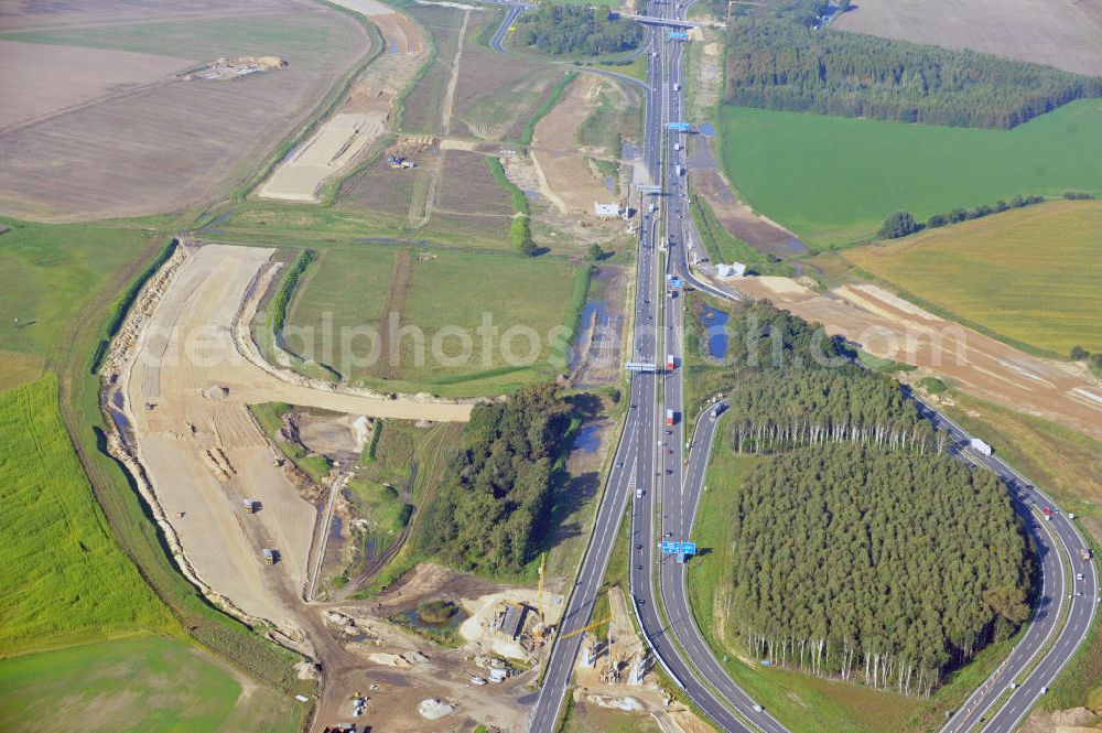 Schwanebeck from the bird's eye view: Baustelle vom Autobahndreieck Kreuz Barnim, vormals AD Schwanebeck, mit Aus- und Umbauarbeiten. Die EUROVIA führt im Auftrag des Landesbetrieb Brandenburg umfangreiche Abbruch-, Erdarbeiten und den Neubau von Brückenbauwerken zum Um- und Ausbau des Autobahndreiecks (AD) Barnim am nördlichen Berliner Ring durch. View of the construction site at the highway triangle Kreuz Barnim.