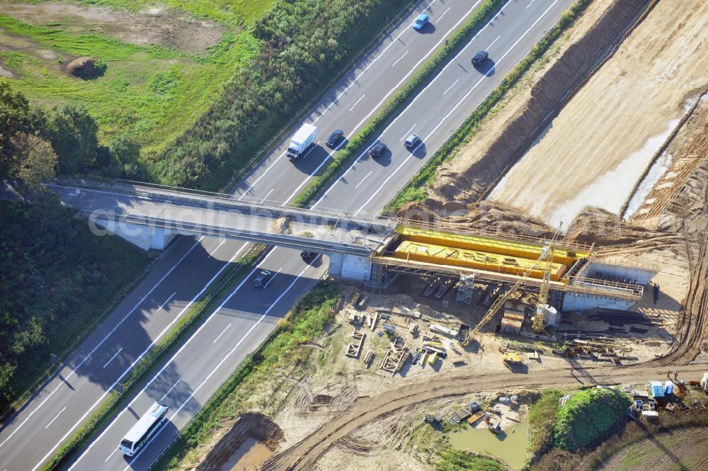 Aerial image Schwanebeck - Baustelle vom Autobahndreieck Kreuz Barnim, vormals AD Schwanebeck, mit Aus- und Umbauarbeiten. Die EUROVIA führt im Auftrag des Landesbetrieb Brandenburg umfangreiche Abbruch-, Erdarbeiten und den Neubau von Brückenbauwerken zum Um- und Ausbau des Autobahndreiecks (AD) Barnim am nördlichen Berliner Ring durch. View of the construction site at the highway triangle Kreuz Barnim.