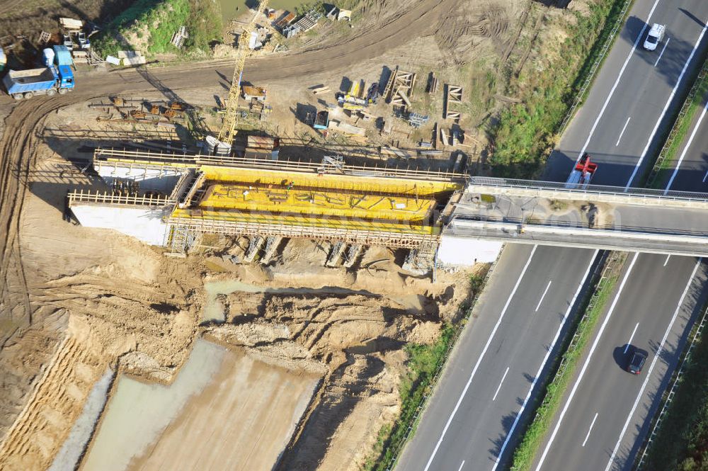 Aerial image Schwanebeck - Baustelle vom Autobahndreieck Kreuz Barnim, vormals AD Schwanebeck, mit Aus- und Umbauarbeiten. Die EUROVIA führt im Auftrag des Landesbetrieb Brandenburg umfangreiche Abbruch-, Erdarbeiten und den Neubau von Brückenbauwerken zum Um- und Ausbau des Autobahndreiecks (AD) Barnim am nördlichen Berliner Ring durch. View of the construction site at the highway triangle Kreuz Barnim.