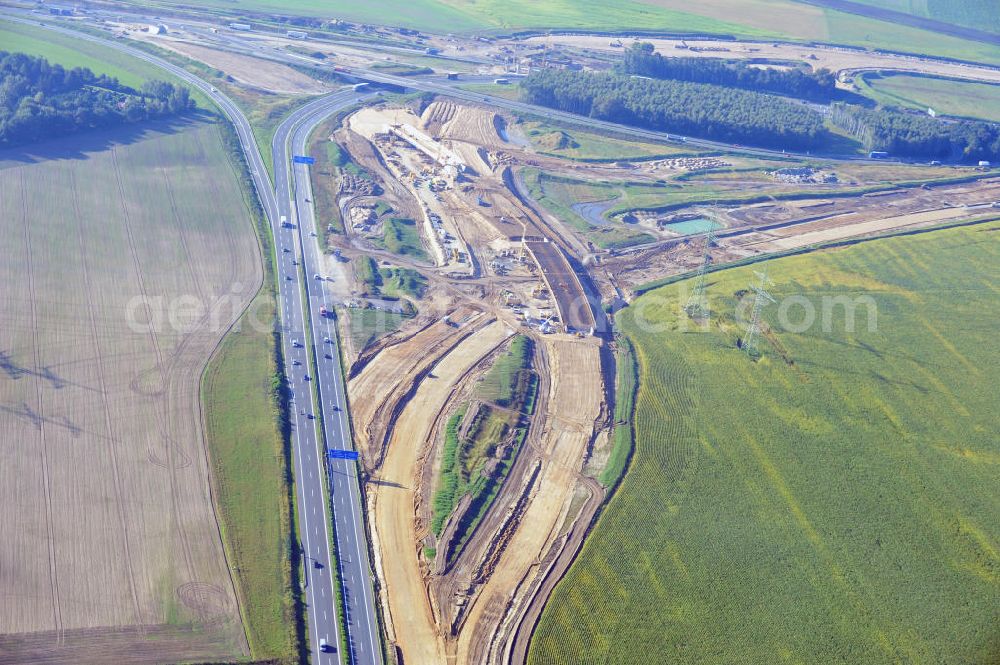 Schwanebeck from the bird's eye view: Baustelle vom Autobahndreieck Kreuz Barnim, vormals AD Schwanebeck, mit Aus- und Umbauarbeiten. Die EUROVIA führt im Auftrag des Landesbetrieb Brandenburg umfangreiche Abbruch-, Erdarbeiten und den Neubau von Brückenbauwerken zum Um- und Ausbau des Autobahndreiecks (AD) Barnim am nördlichen Berliner Ring durch. View of the construction site at the highway triangle Kreuz Barnim.