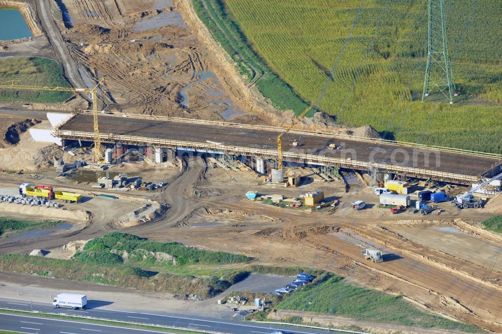 Schwanebeck from the bird's eye view: Baustelle vom Autobahndreieck Kreuz Barnim, vormals AD Schwanebeck, mit Aus- und Umbauarbeiten. Die EUROVIA führt im Auftrag des Landesbetrieb Brandenburg umfangreiche Abbruch-, Erdarbeiten und den Neubau von Brückenbauwerken zum Um- und Ausbau des Autobahndreiecks (AD) Barnim am nördlichen Berliner Ring durch. View of the construction site at the highway triangle Kreuz Barnim.