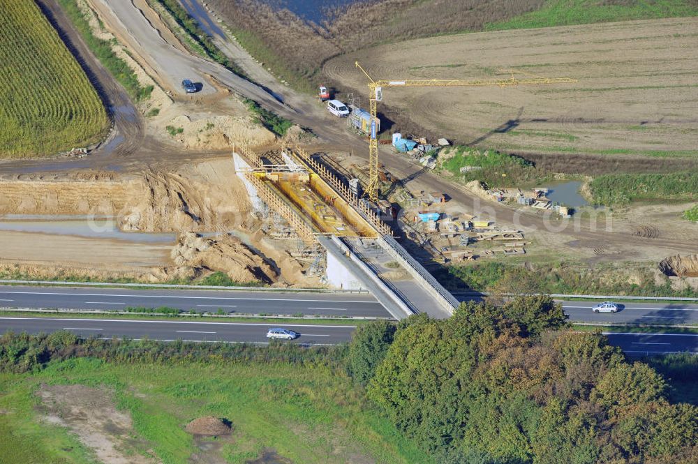 Aerial image Schwanebeck - Baustelle vom Autobahndreieck Kreuz Barnim, vormals AD Schwanebeck, mit Aus- und Umbauarbeiten. Die EUROVIA führt im Auftrag des Landesbetrieb Brandenburg umfangreiche Abbruch-, Erdarbeiten und den Neubau von Brückenbauwerken zum Um- und Ausbau des Autobahndreiecks (AD) Barnim am nördlichen Berliner Ring durch. View of the construction site at the highway triangle Kreuz Barnim.