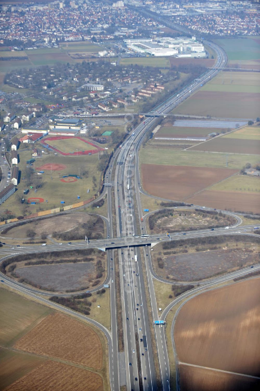 Heidelberg from the bird's eye view: HEIDELBERG 03/09/2012 overlooking the junction junction (AS) in Heidelberg / Schwetzingen (A5 - 38) at Patrick Henry Village residential area