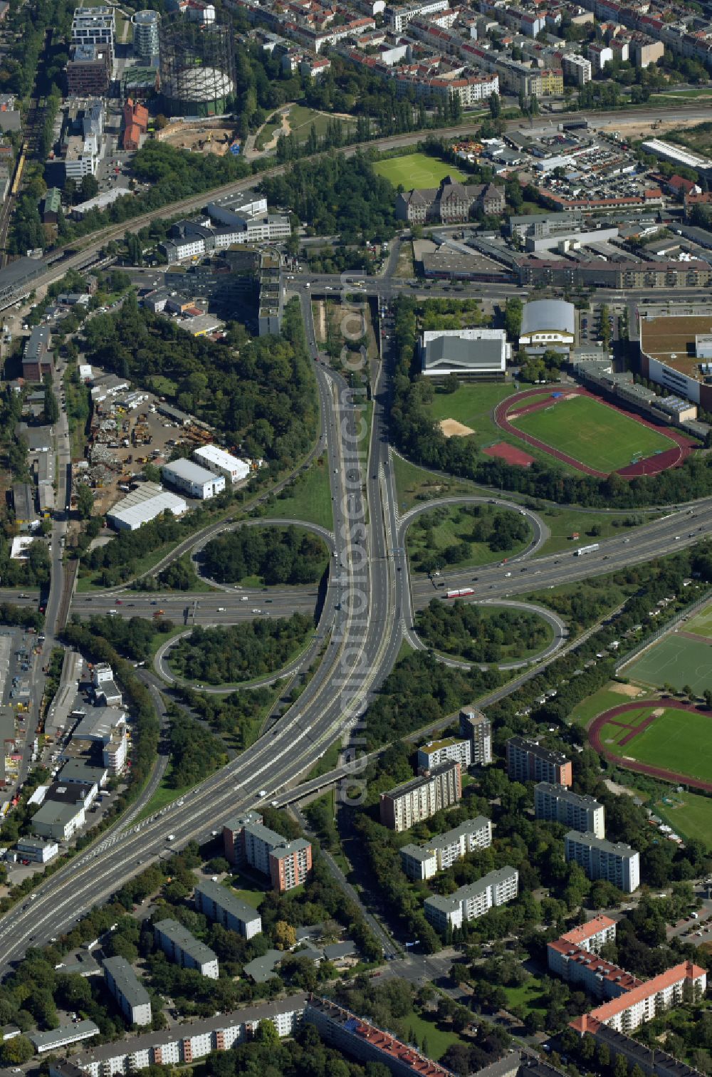 Aerial image Berlin - Traffic flow at the intersection- motorway A100 - A103 in form of cloverleaf in the district Schoeneberg in Berlin, Germany