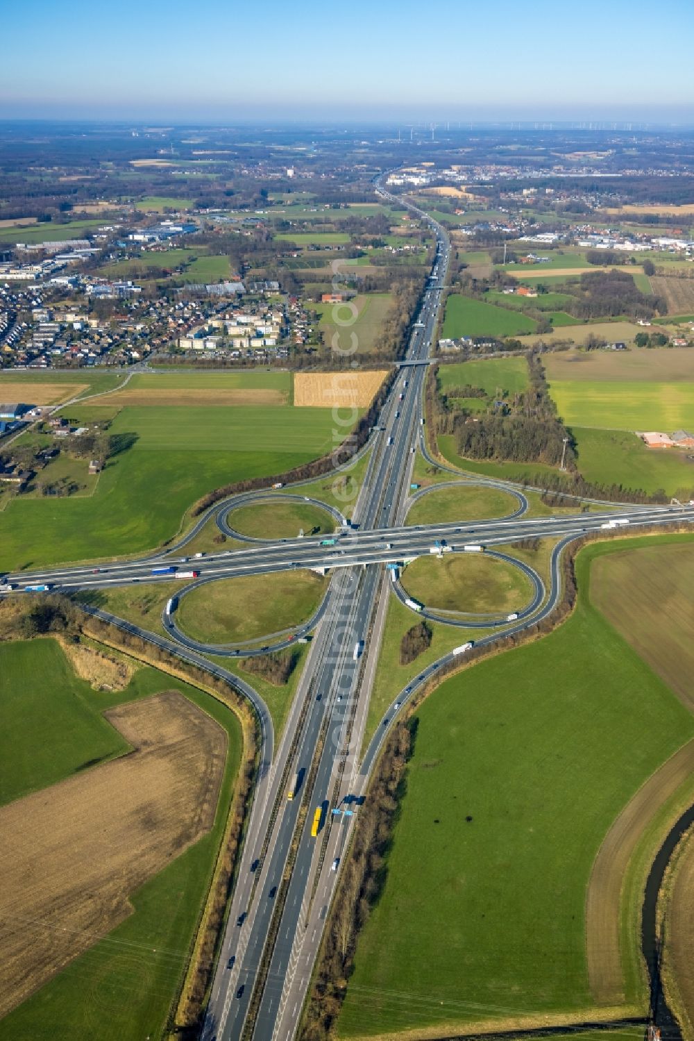 Lotte from the bird's eye view: Traffic flow at the intersection- motorway A30 - A1 Kreuz Lotte/Osnabrueck in form of cloverleaf in Lotte in the state North Rhine-Westphalia, Germany