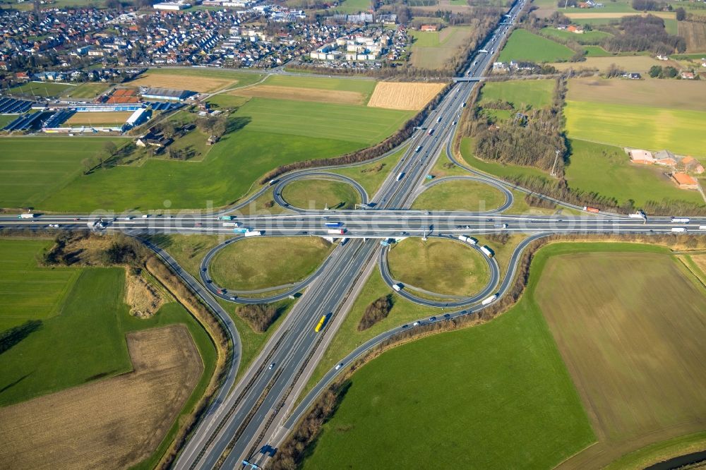 Aerial photograph Lotte - Traffic flow at the intersection- motorway A30 - A1 Kreuz Lotte/Osnabrueck in form of cloverleaf in Lotte in the state North Rhine-Westphalia, Germany