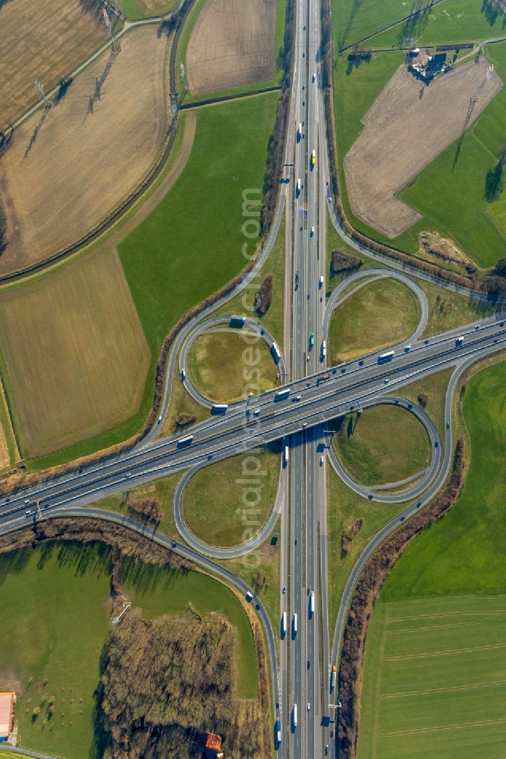 Aerial photograph Lotte - Traffic flow at the intersection- motorway A30 - A1 Kreuz Lotte/Osnabrueck in form of cloverleaf in Lotte in the state North Rhine-Westphalia, Germany