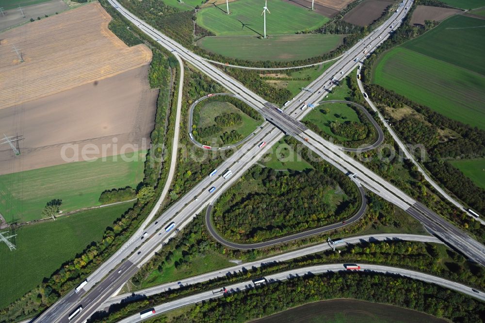 Niederndodeleben from the bird's eye view: Traffic flow at the intersection- motorway A 2 - A14 Kreuz Magdeburg in Niederndodeleben in the state Saxony-Anhalt, Germany