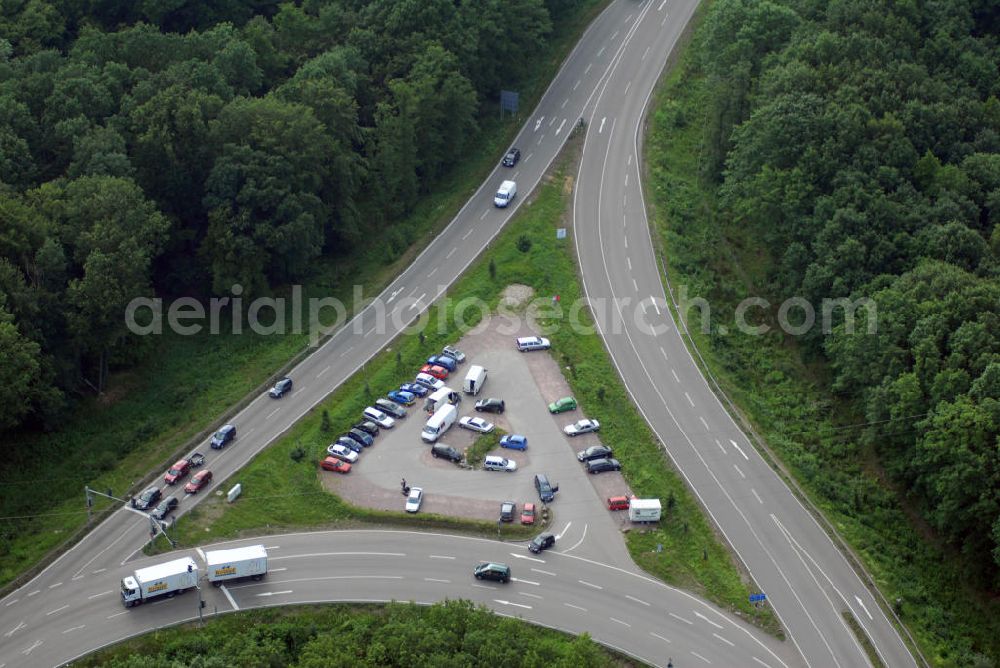 Aerial photograph Offenburg - Blick auf die Autobahnabfahrt Offenburg. Die Abfahrt Offenburg ist Teil der A5 vom Hattenbacher Dreieck bis an die Grenze zur Schweiz. Auf 445 km Länge bestehen Verbindungen u.a. zum französischen Autobahnnetz (bis Barcelona) und zur Verbindung Holland - Österreich. Als Teil der HaFraBa E.V. (Nord-Süd Verbindung) ist sie eine der meist befahrensten Strassen Europas.