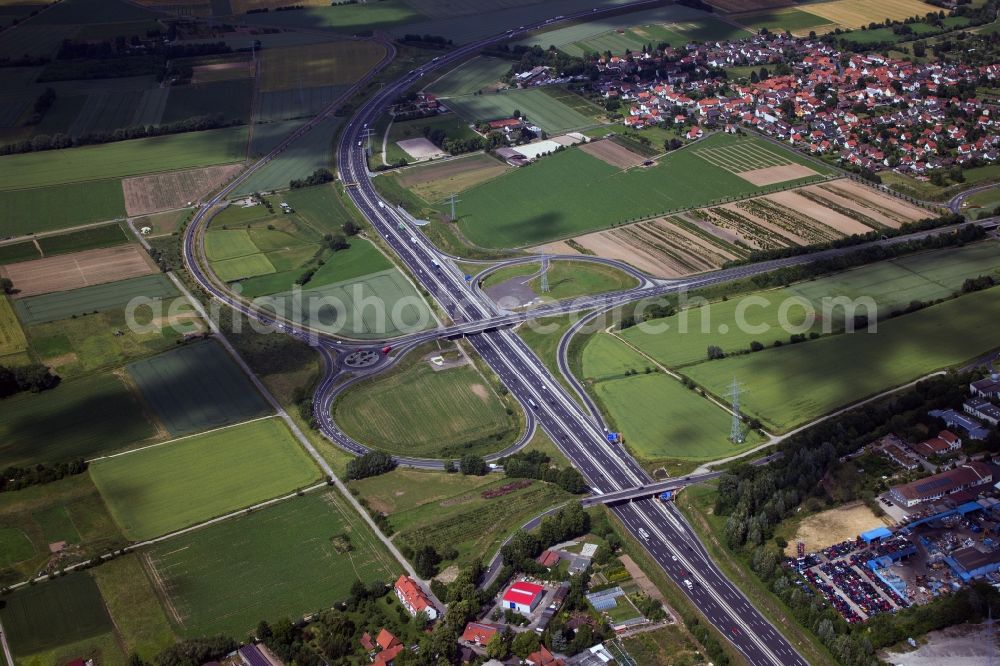 Göttingen from the bird's eye view: Motorway intersection surrounded by fields. There intersect the Bundesautobahn 7 BAB7 / Europastrasse 45 E45 and Bundesstrasse 3 B3 in the district Elliehausen in Einbeck in Lower Saxony