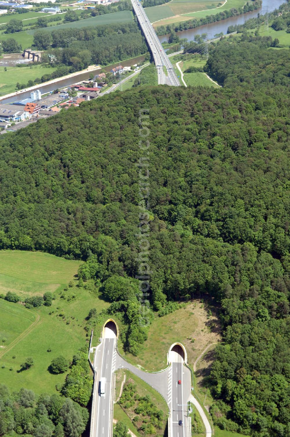 Limbach from the bird's eye view: Blick auf den Autobahntunnel Schwarzer Berg der BAB Bundesautobahn A70 / E48 bei Eltmann/Limbach. Der Tunnel wurde in bergmännischer Weise mit zwei Röhren gebaut und hat eine Länge von 730 m. View of the Black Mountain Highway Tunnel motorway BAB A70 / E48 at Eltmann / Limbach. The tunnel was built in the mining way, with two tubes and has a length of 730 m.