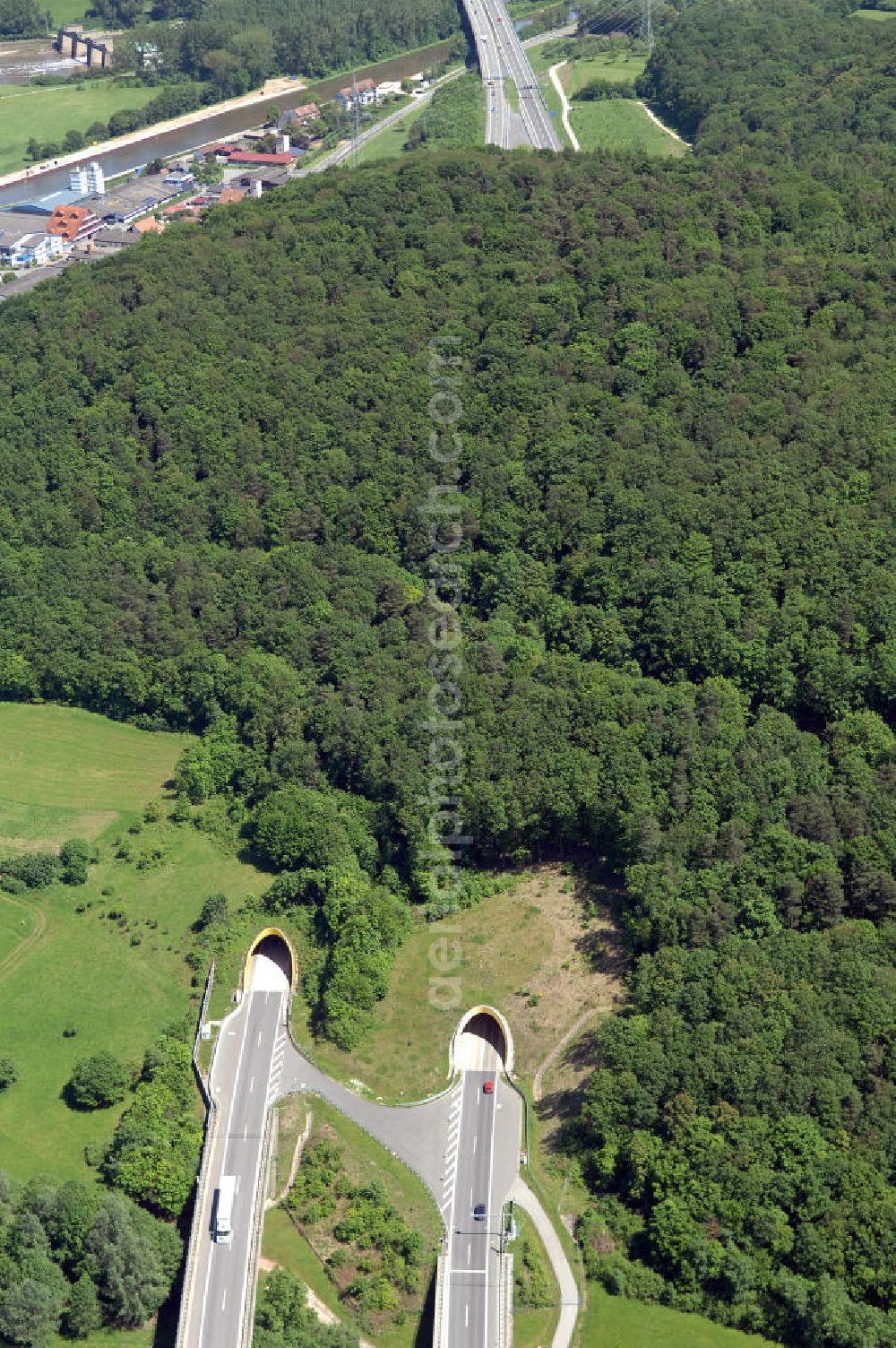 Aerial photograph Limbach - Blick auf den Autobahntunnel Schwarzer Berg der BAB Bundesautobahn A70 / E48 bei Eltmann/Limbach. Der Tunnel wurde in bergmännischer Weise mit zwei Röhren gebaut und hat eine Länge von 730 m. View of the Black Mountain Highway Tunnel motorway BAB A70 / E48 at Eltmann / Limbach. The tunnel was built in the mining way, with two tubes and has a length of 730 m.