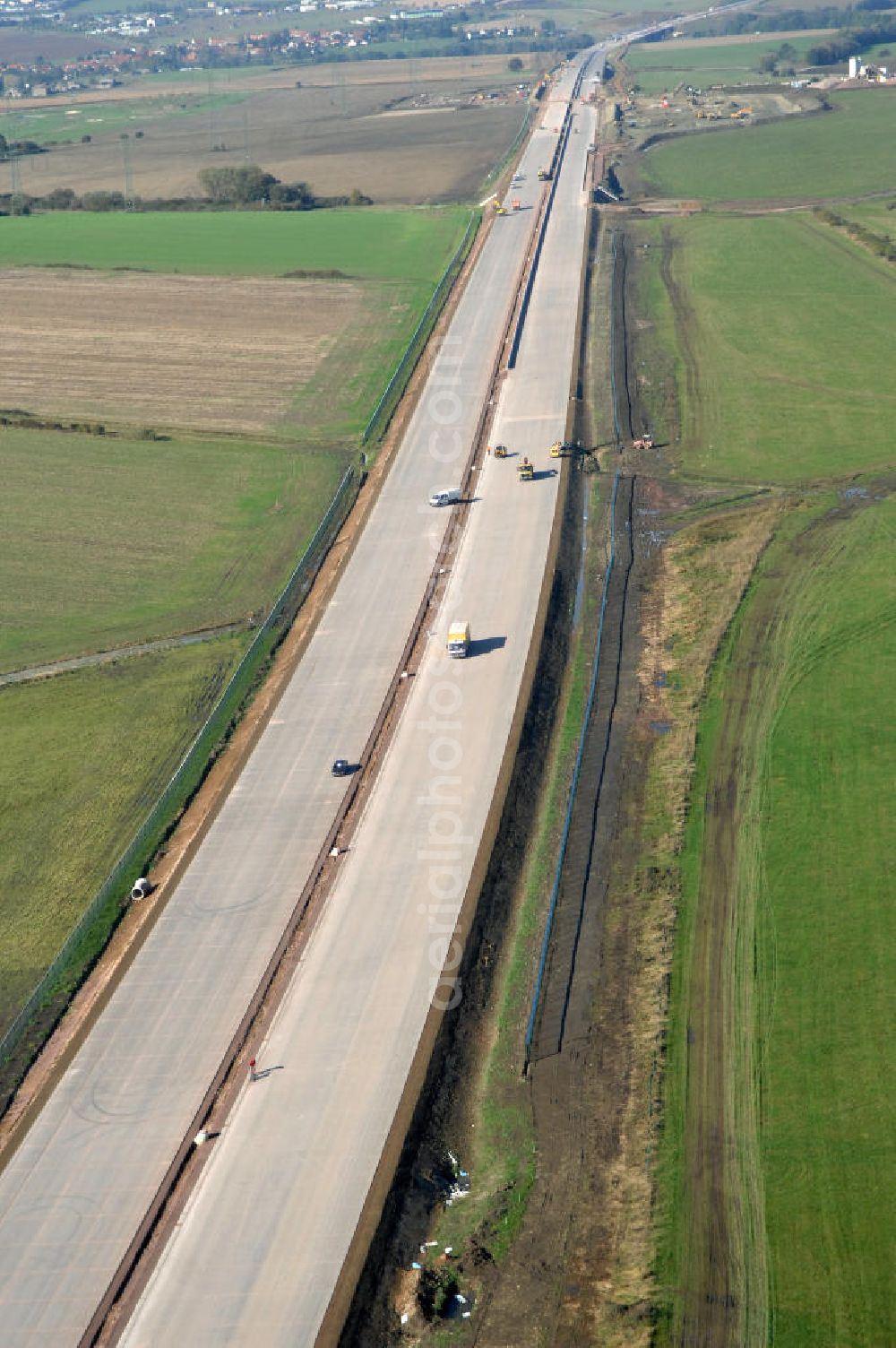 Aerial photograph Wenigenlupnitz - Blick auf die Baustelle des Autobahnverlauf A4 Richtung Westen der südlichen (h) und nördlichen (v) PWC-Anlage / Parkplatz mit WC / Rastplatz der A4 bei Wenigenlupnitz. Der Neubau ist Teil des Projekt Nordverlegung / Umfahrung Hörselberge der Autobahn E40 / A4 in Thüringen bei Eisenach. Durchgeführt werden die im Zuge dieses Projektes notwendigen Arbeiten unter an derem von den Mitarbeitern der Niederlassung Weimar der EUROVIA Verkehrsbau Union sowie der Niederlassungen Abbruch und Erdbau, Betonstraßenbau, Ingenieurbau und TECO Schallschutz der EUROVIA Beton sowie der DEGES.