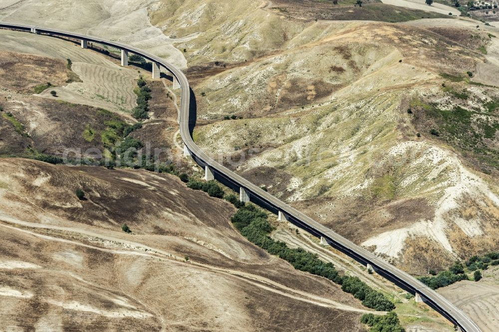 Aerial photograph Craco - Motorway viaduct course of the SS103 in Craco in Italy