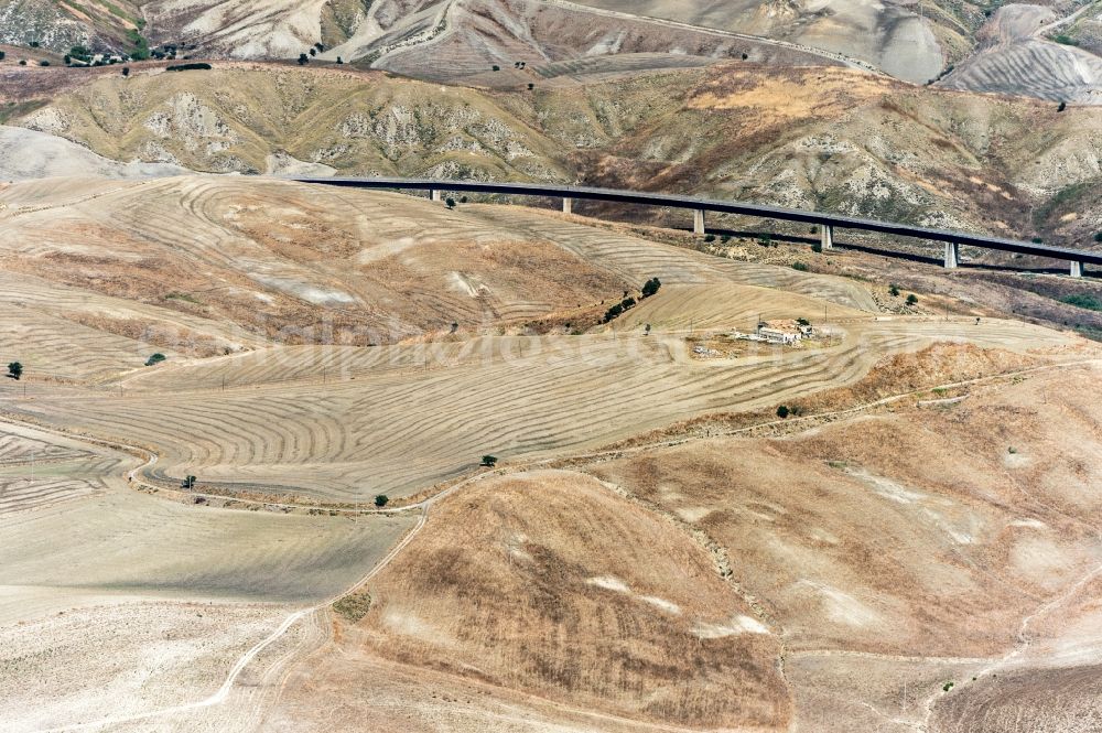 Aerial photograph Craco - Motorway viaduct course of the SS103 in Craco in Italy