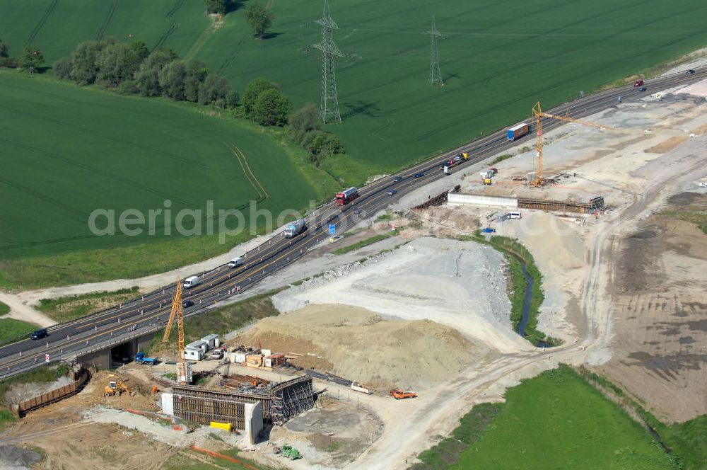 Aerial photograph Bucha - Blick auf die Baustelle der Autobahnverlegung Europastrasse E40 A4 bei Schorba , Bucha und Oßmaritz nördlich des bisherigen Verlaufes. Bauherr: DEGES (Deutsche Einheit Fernstraßenplanungs- und bau GmbH, Berlin), Bauausführung: ARGE: Baresel, Beton und Monierbau, Kirchhoff Leipzig Ausführungsplanung: Bauzeit: 2008 - 2012 View of the construction site of the highway relocation E40 European highway A4 near Schorba, Bucha and Oßmaritz north of the existing course.