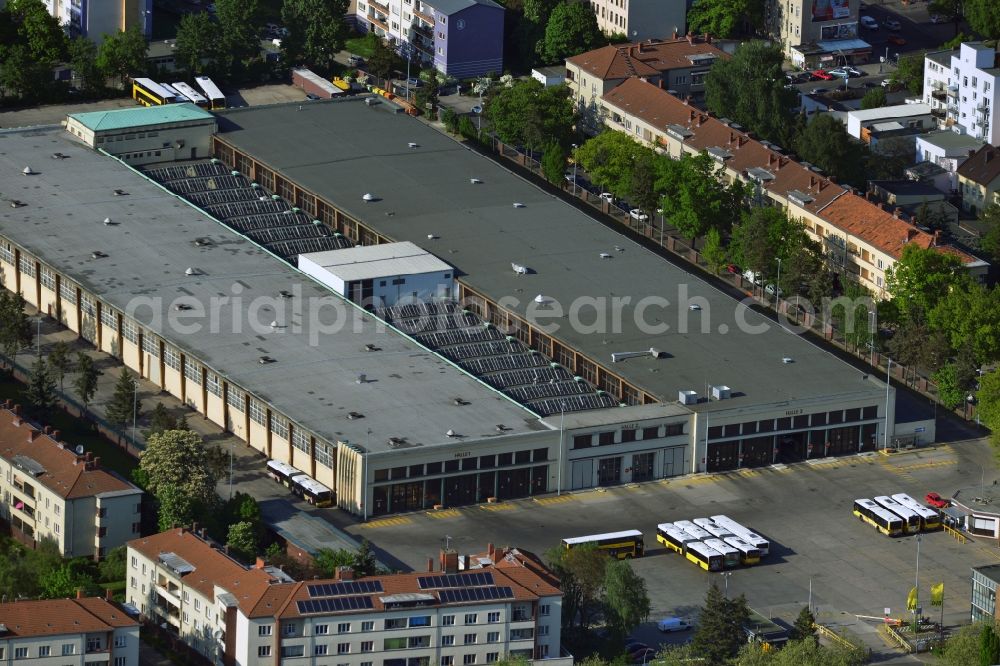 Aerial image Berlin - In the Grade street in Stadtbezitk Neukoelln of Berlin there is the bus depot Britz. In the hall several hundred buses of BvG be prepared and waiting for their transport rides in the south of Berlin daily