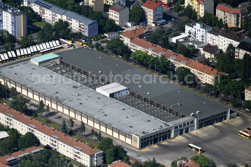 Berlin from above - In the Grade street in Stadtbezitk Neukoelln of Berlin there is the bus depot Britz. In the hall several hundred buses of BvG be prepared and waiting for their transport rides in the south of Berlin daily