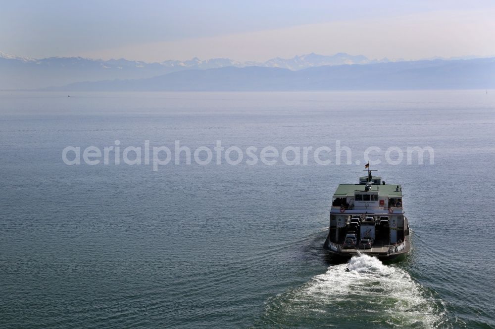 Friedrichshafen from the bird's eye view: Car ferry leaving the port in Friedrichshafen in the state of Baden-Wuerttemberg. Looking over the Lake Constance to the alps