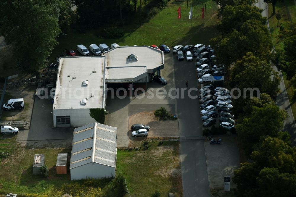 Aerial image Werneuchen - Car dealership building VW Autohaus Hubert Thies on Freienwalder Chaussee in Werneuchen in the state Brandenburg