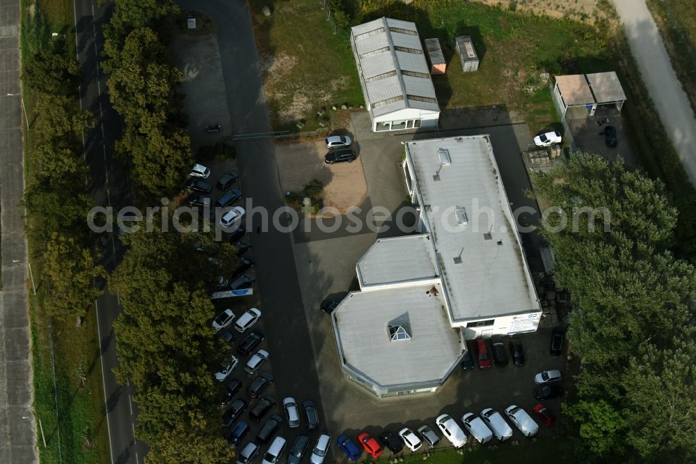 Werneuchen from the bird's eye view: Car dealership building VW Autohaus Hubert Thies on Freienwalder Chaussee in Werneuchen in the state Brandenburg