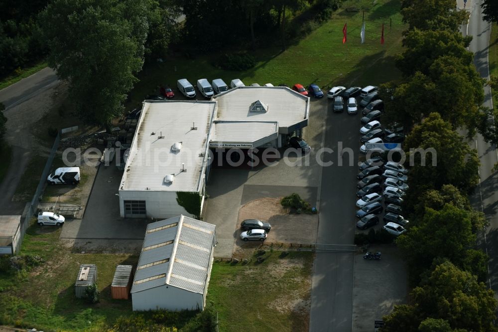 Werneuchen from the bird's eye view: Car dealership building VW Autohaus Hubert Thies on Freienwalder Chaussee in Werneuchen in the state Brandenburg