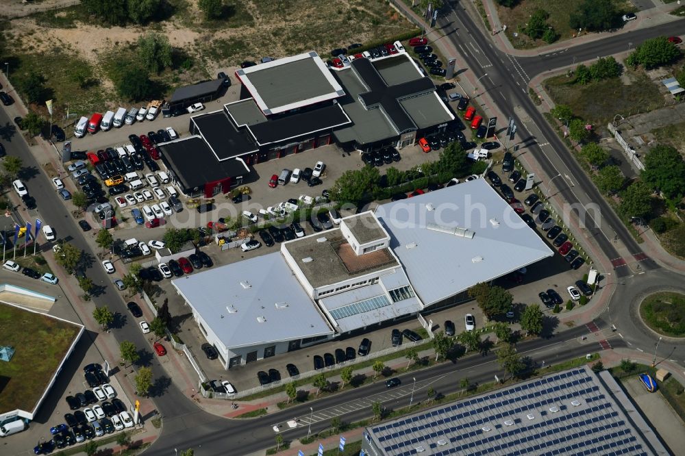 Teltow from the bird's eye view: Car dealership building on Warthestrasse in Teltow in the state Brandenburg, Germany