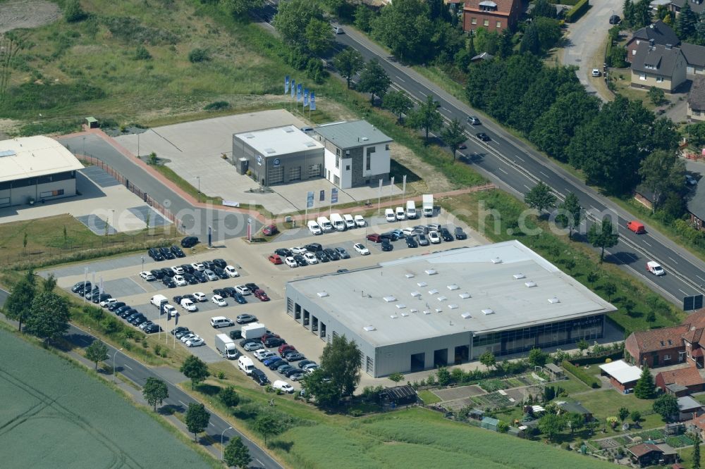 Garbsen from the bird's eye view: Car dealer Auto Schrader GmbH and TUeV station in the Meyenfeld-East part of Garbsen in the state of Lower Saxony. The compound with the car dealer and TUeV control centre is located on federal highway B6, Bremerstrasse