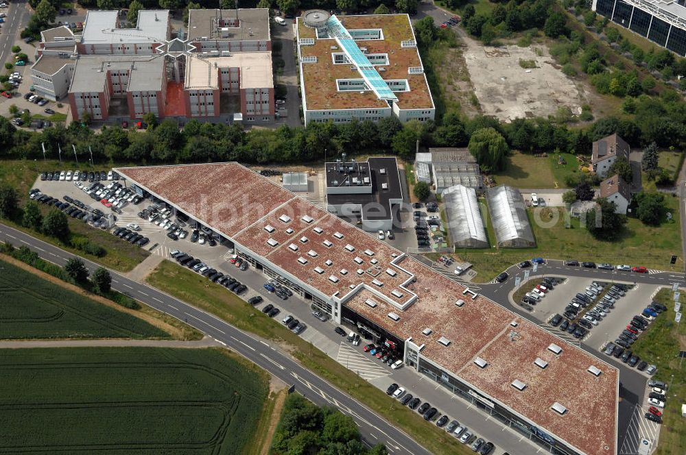 Bad Homburg von der Höhe from above - Blick auf ein Autohaus und Bürokomplexe im Stadtteil Ober-Eschbach von Bad Homburg von der Höhe in Hessen. Die Filiale des Autohauses B&K...alles klar! GmbH & Co. KG wurde 2007 eröffnet und ist das modernste und größte Autohaus der gesamten B&K-Gruppe. Kontakt: B&K...alles klar! GmbH & Co. KG, Ober-Eschbacher-Str. 153, 61352 Bad Homburg, Tel. +49 (0) 617 230 90 0,