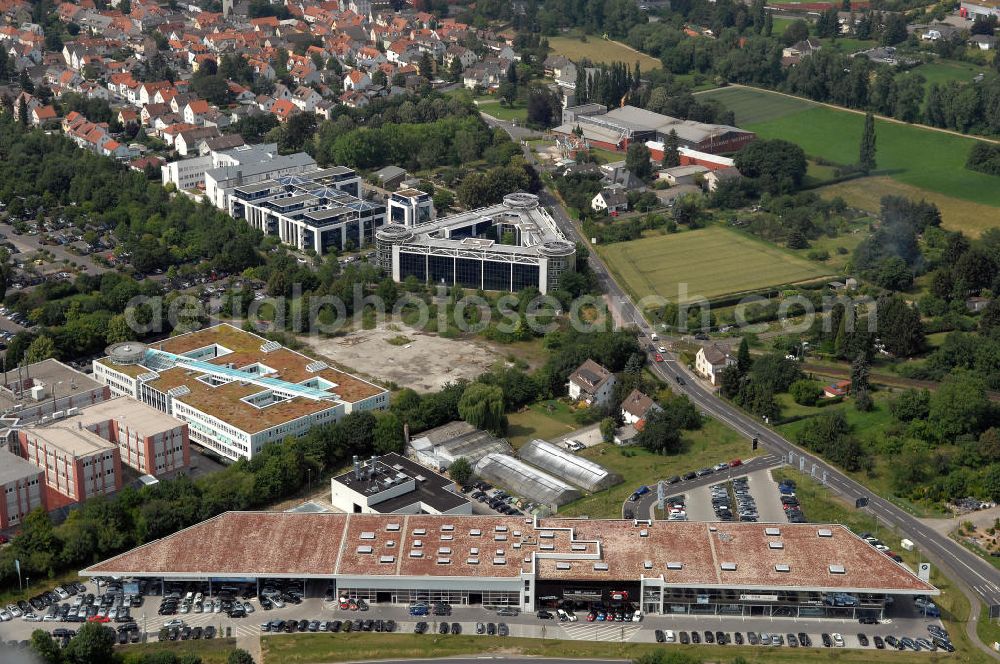 Aerial photograph Bad Homburg von der Höhe - Blick auf ein Autohaus und Bürokomplexe im Stadtteil Ober-Eschbach von Bad Homburg von der Höhe in Hessen. Die Filiale des Autohauses B&K...alles klar! GmbH & Co. KG wurde 2007 eröffnet und ist das modernste und größte Autohaus der gesamten B&K-Gruppe. Kontakt: B&K...alles klar! GmbH & Co. KG, Ober-Eschbacher-Str. 153, 61352 Bad Homburg, Tel. +49 (0) 617 230 90 0,