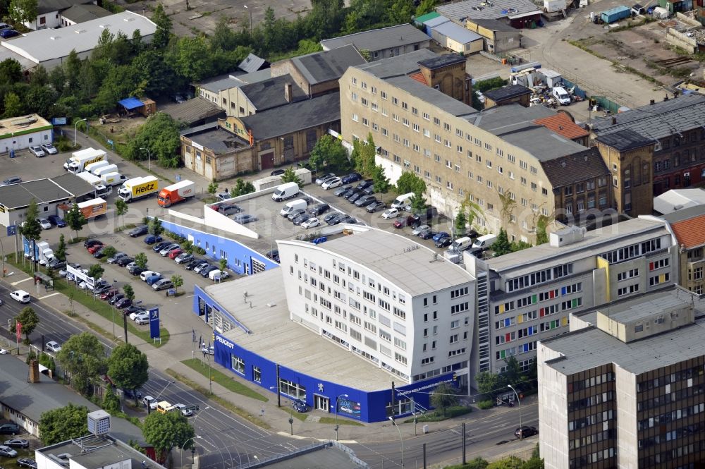 Berlin from above - The site of the Peugeot dealership BERLIN BRANDENBURG GMBH at the Siegfried in Berlin Lichtenberg