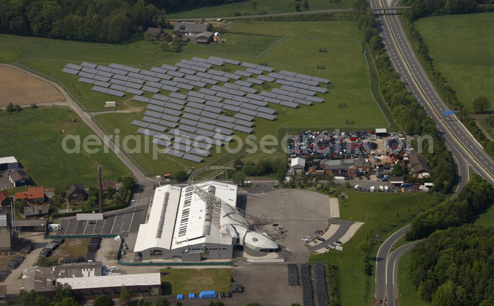 Aerial photograph Dülmen - Die Manufaktur vom Autoherstellerunternehmen Wiesmann in Dülmen, Nordrhein-Westfalen. Prägnant ist der Eingangsbereich in Form eines Gecko. The manufacture of the carmaker company Wiesmann GmbH in Duelmen, North Rhine-Westphalia. Remarkable is the entrance area in the shape of a gecko.