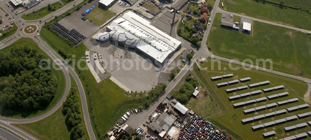 Dülmen from the bird's eye view: Die Manufaktur vom Autoherstellerunternehmen Wiesmann in Dülmen, Nordrhein-Westfalen. Prägnant ist der Eingangsbereich in Form eines Gecko. The manufacture of the carmaker company Wiesmann GmbH in Duelmen, North Rhine-Westphalia. Remarkable is the entrance area in the shape of a gecko.