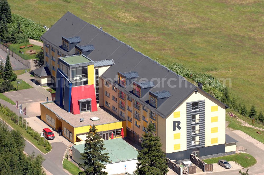 Oberhof from the bird's eye view: Blick auf das Ferienzentrum Oberhof / Rennsteig, ein Haus der AWO Sano Thüringen gGmbH. Das Haus besitzt 66 Zimmer sowie Tagungs- und Veranstaltungsräume. Es ist ca. 10 km von Oberhof entfernt und liegt am Waldrand des Rennsteiggebietes. Oberhof ist als deutsches Wintersportzentrum bekannt. Besonders populär sind hier die Sportarten Biathlon, Rennrodeln bzw. Bobsport, Skilanglauf und die Nordische Kombination. Die Stadt lebt vom Tourismus. Kontakt AWO SANO Ferienzentrum Oberhof / Rennsteig: info@awosano.de