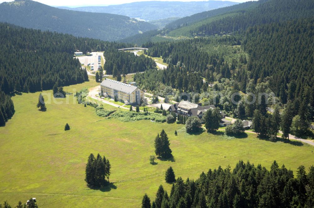 Aerial photograph Oberhof - Blick auf das Ferienzentrum Oberhof / Rennsteig, ein Haus der AWO Sano Thüringen gGmbH. Das Haus besitzt 66 Zimmer sowie Tagungs- und Veranstaltungsräume. Es ist ca. 10 km von Oberhof entfernt und liegt am Waldrand des Rennsteiggebietes. Oberhof ist als deutsches Wintersportzentrum bekannt. Besonders populär sind hier die Sportarten Biathlon, Rennrodeln bzw. Bobsport, Skilanglauf und die Nordische Kombination. Die Stadt lebt vom Tourismus. Kontakt AWO SANO Ferienzentrum Oberhof / Rennsteig: info@awosano.de