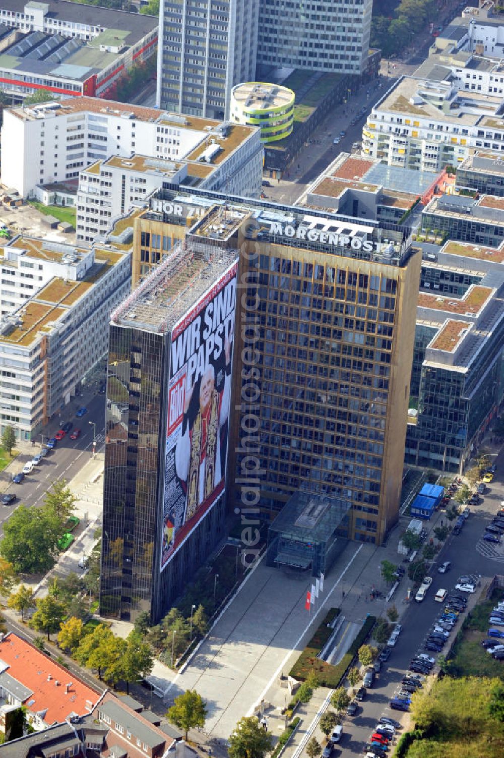 Berlin Kreuzberg from above - Verlagsgebäude Axel-Springer-Haus geschmückt mit der Tietelseite der Bildzeitung vom Tag nach der Wahl von Joseph Ratzinger zum Papst Benedikt XVI in Berlin-Kreuzberg. Publisher building Axel-Springer-Haus decorated with the cover of the newspaper Bild from the day after the election of Joseph Ratzinger to Pope Benedict XVI in Berlin-Kreuzberg.