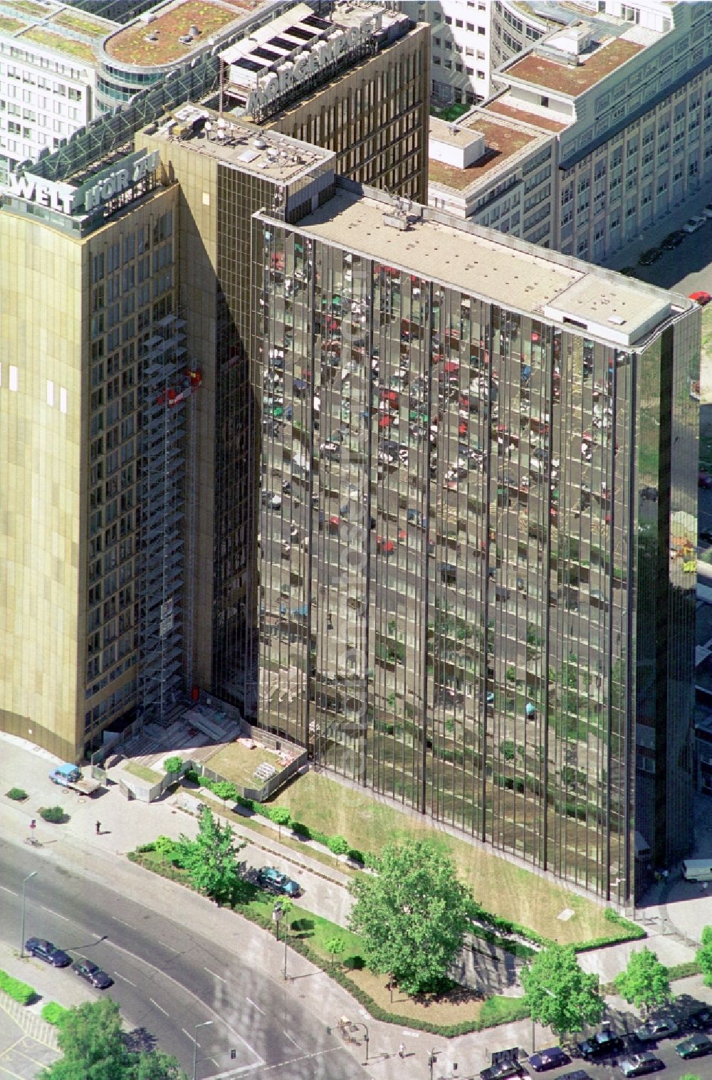 Aerial image Berlin Kreuzberg - Look at the Axel-Springer tower of the Axel Springer AG at the Rudi-Dutschke street and Axel-Springer street in Kreuzberg district in Berlin